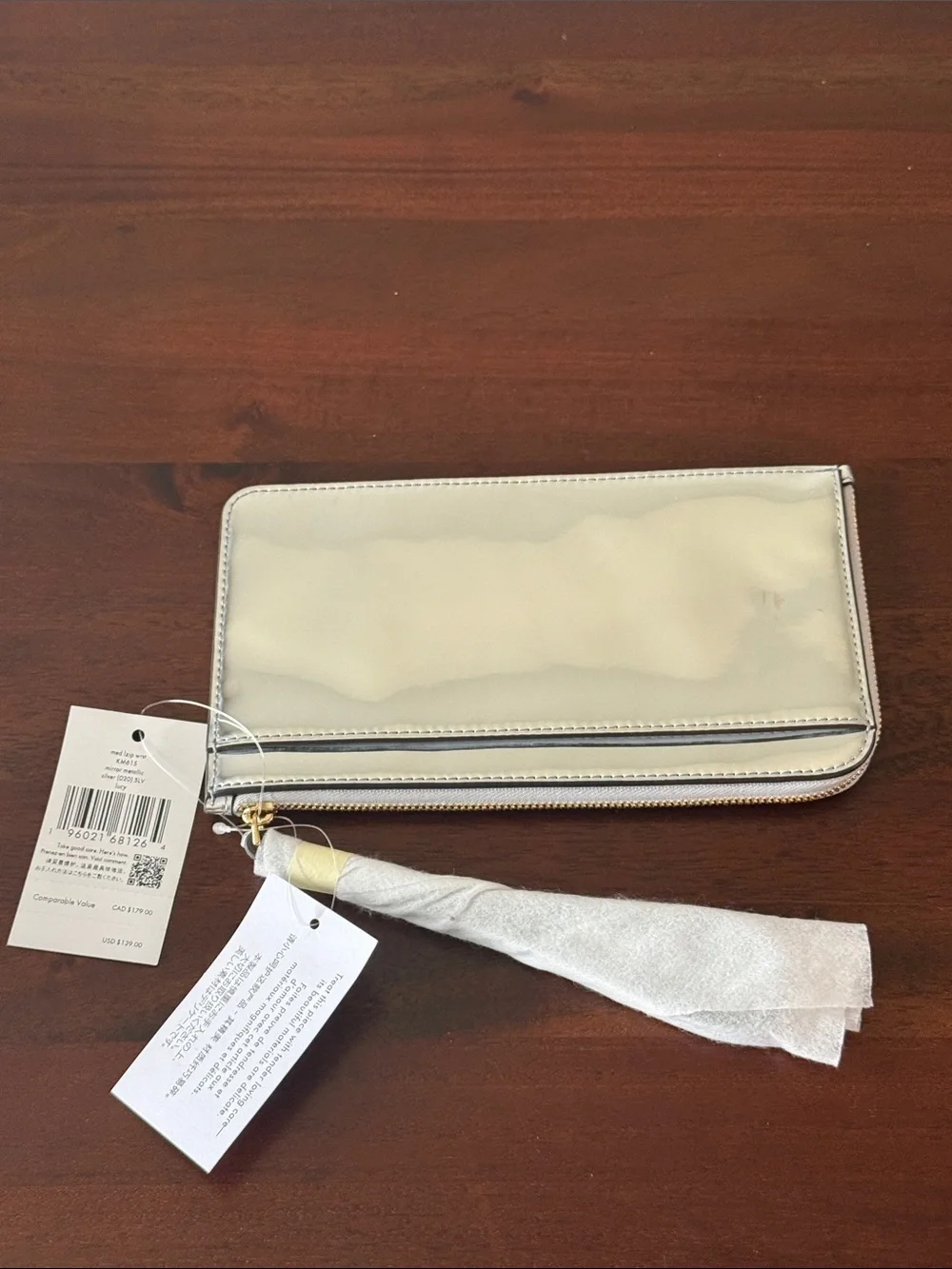 kate spade New York Lucy Metallic Silver L Zip-Around Wristlet new